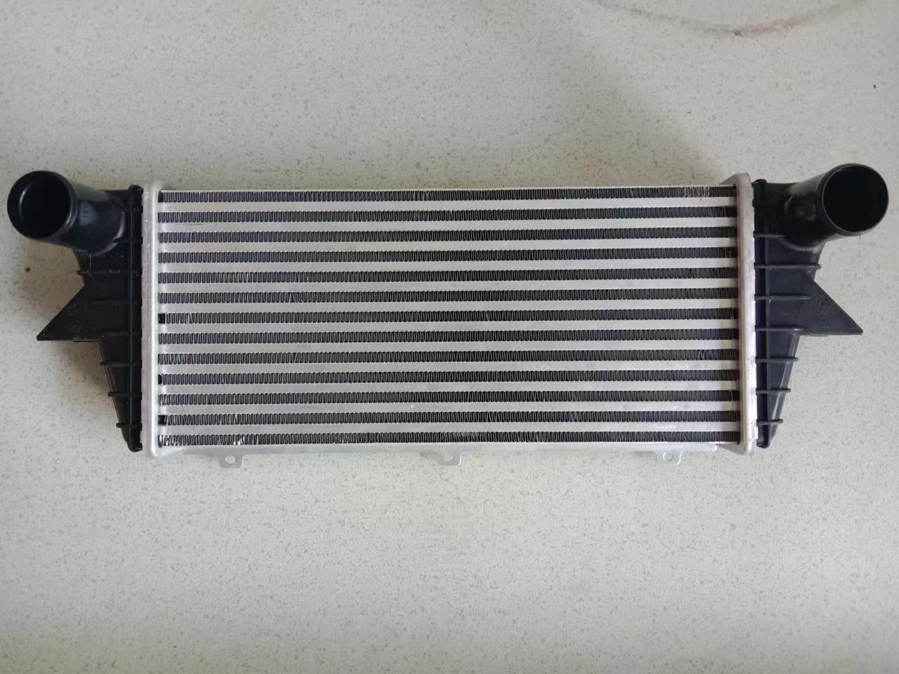 JP1-9L440-AB car Intercooler，charge air cooler for Isuzu  JMC VIGUS
